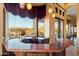 Wet bar with granite countertop, offering scenic views at 9782 E Troon North Dr, Scottsdale, AZ 85262