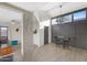 Modern dining area with a small table and two bar stools at 10624 N 7Th Pl, Phoenix, AZ 85020