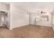 Open living room featuring high ceilings and a neutral color palette at 1490 E 11Th St, Casa Grande, AZ 85122