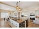 Spacious kitchen with island, granite countertops, and stainless steel appliances at 15528 E Golden Eagle Blvd, Fountain Hills, AZ 85268