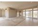 Bright living room featuring tile floors, sliding glass doors, and views at 15559 E Golden Eagle Blvd, Fountain Hills, AZ 85268