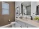 Stylish bathroom with a modern vanity and walk in shower at 17236 W Roseville St, Surprise, AZ 85388