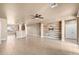 Spacious living room featuring a tile floor and built-in media wall at 18616 W Illini St, Goodyear, AZ 85338