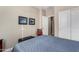 Cozy bedroom with double bed and built-in closet at 19826 W Devonshire Ave, Litchfield Park, AZ 85340