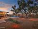 Relaxing pool area with patio and string lights at 3809 N 87Th Pl, Scottsdale, AZ 85251