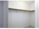 Bright bedroom closet with wood shelving for hanging clothes at 3950 N San Carlos Dr, Eloy, AZ 85131