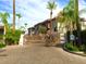 Gated community entry with paved driveway and landscaping at 4343 N 21St St # 203, Phoenix, AZ 85016