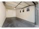 Attached garage with overhead door and storage cabinets at 4343 N 21St St # 203, Phoenix, AZ 85016