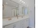 Double vanity bathroom with large mirror and modern fixtures at 4777 S Fulton Ranch Blvd # 2068, Chandler, AZ 85248