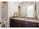 Bathroom with granite vanity and walk-in shower at 7674 W Antelope Dr, Peoria, AZ 85383