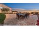 Spacious patio with dining table near the pool at 8443 E Jensen St, Mesa, AZ 85207