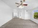 Spacious primary bedroom with carpet and ensuite bathroom access at 1218 E Sea Gull Dr, Gilbert, AZ 85234