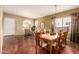 Formal dining room with hardwood floors and a chandelier at 1334 W Deer Creek Rd, Phoenix, AZ 85045