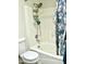 Bathroom with shower/tub combo and patterned shower curtain at 15241 W Elm Cir, Surprise, AZ 85374