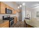 Kitchen features stainless steel appliances and wood cabinets at 17132 W Tara Ln, Surprise, AZ 85388