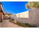 Small backyard with brick pavers and a wall at 17633 N Lindner Dr, Glendale, AZ 85308