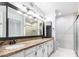 Bathroom features double sinks, granite countertop, and shower at 17633 N Lindner Dr, Glendale, AZ 85308