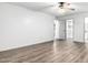 Bright bedroom with wood-look floors and spacious closet at 17633 N Lindner Dr, Glendale, AZ 85308