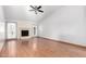 Bright living room with hardwood floors, fireplace, and lots of natural light at 17633 N Lindner Dr, Glendale, AZ 85308