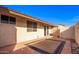 Private patio with flagstone flooring and access to unit at 17633 N Lindner Dr, Glendale, AZ 85308