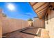 Private patio with flagstone flooring and storage at 17633 N Lindner Dr, Glendale, AZ 85308
