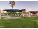 Relaxing picnic area with tables under a shaded structure at 17633 N Lindner Dr, Glendale, AZ 85308