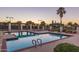 Community pool and spa with surrounding seating at 17633 N Lindner Dr, Glendale, AZ 85308