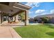 Relaxing patio area overlooking the pool and backyard at 17931 W Oregon Ave, Litchfield Park, AZ 85340