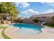 Stunning freeform pool with rock waterfall feature at 17931 W Oregon Ave, Litchfield Park, AZ 85340