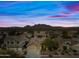 Luxury home community with mountain views at sunset at 2122 W Red Range Way, Phoenix, AZ 85085
