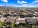 Aerial view showcasing a house and surrounding neighborhood at 2122 W Red Range Way, Phoenix, AZ 85085