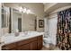 Bathroom with tub, shower, and updated vanity at 2122 W Red Range Way, Phoenix, AZ 85085