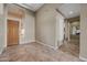 Bright and spacious entryway with tiled floors at 2122 W Red Range Way, Phoenix, AZ 85085