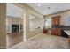 Spacious kitchen with dark wood cabinets, granite countertops, and stainless steel appliances at 2122 W Red Range Way, Phoenix, AZ 85085