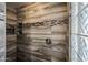 Walk-in shower with wood-look tile and glass block at 2122 W Red Range Way, Phoenix, AZ 85085