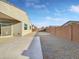 Backyard with gravel and block wall at 2607 E Corazon Trl, Casa Grande, AZ 85194