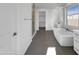 Elegant bathroom featuring a soaking tub, walk-in shower, and modern vanity at 2607 E Corazon Trl, Casa Grande, AZ 85194