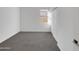 Well-lit bedroom, featuring gray carpet and double door closet at 2607 E Corazon Trl, Casa Grande, AZ 85194