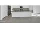 Modern kitchen with large island and stainless steel appliances at 2607 E Corazon Trl, Casa Grande, AZ 85194