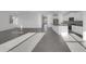 Bright and airy living area with tile flooring and open floor plan at 2607 E Corazon Trl, Casa Grande, AZ 85194