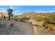 Backyard with mountain views and desert landscape at 27 N Muleshoe Rd, Apache Junction, AZ 85119