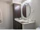 Modern bathroom with vanity, mirror, and updated fixtures at 29606 N Tatum Blvd # 285, Cave Creek, AZ 85331