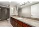 Bathroom with granite countertop, large mirror, and shower at 3600 N 5Th Ave # 304, Phoenix, AZ 85013