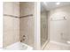 Bathroom with shower/tub combo and tile surround at 3600 N 5Th Ave # 304, Phoenix, AZ 85013