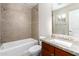 Clean bathroom with granite countertop and tub shower at 3600 N 5Th Ave # 304, Phoenix, AZ 85013