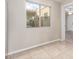 Bedroom with tile flooring and view of patio at 3600 N 5Th Ave # 304, Phoenix, AZ 85013