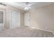 Bright bedroom with carpet flooring and double door closet at 3600 N 5Th Ave # 304, Phoenix, AZ 85013