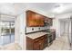 Well-equipped kitchen with granite counters and wood cabinets at 3600 N 5Th Ave # 304, Phoenix, AZ 85013