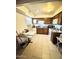 Well-equipped kitchen with wood cabinets and tile floor at 3840 N 43Rd Ave # 29, Phoenix, AZ 85031