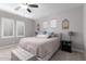 Spacious bedroom with a king-size bed and ensuite bathroom at 3915 E Megan St, Gilbert, AZ 85295